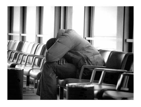 Waitng at the Airport - Black and White Photograph by Audrey Blumeneau